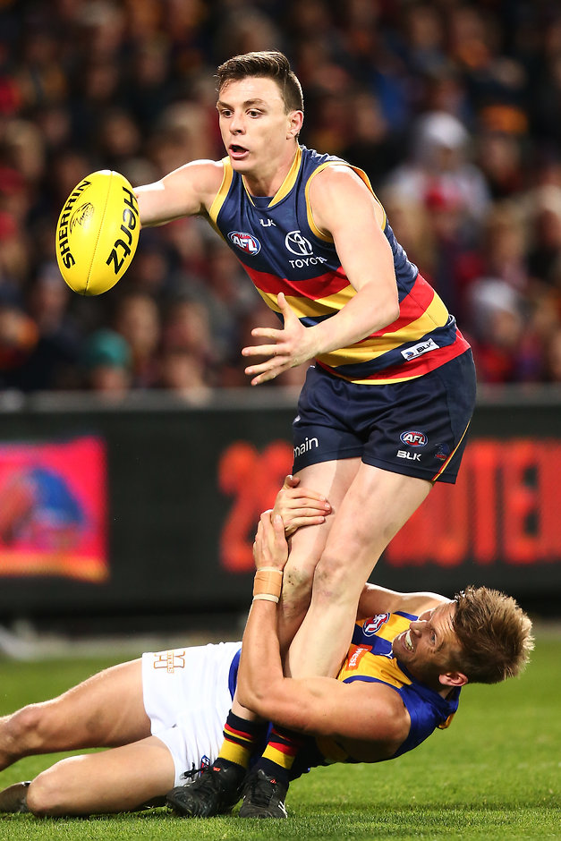 AFL 2016 Rd 23 - Adelaide v West Coast ADELAIDE, AUSTRALIA - AUGUST 26: Mark LeCras of the Eagles tackles Jake Lever of the Crows holding the ball during the round 23 AFL match between the Adelaide Crows and the West Coast Eagles at Adelaide Oval on August 26, 2016 in Adelaide, Australia. (Photo by Morne de Klerk/Getty Images/AFL Media)